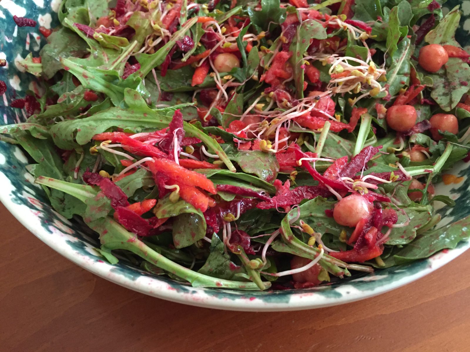 Image of salad with arugula, beets, chick peas